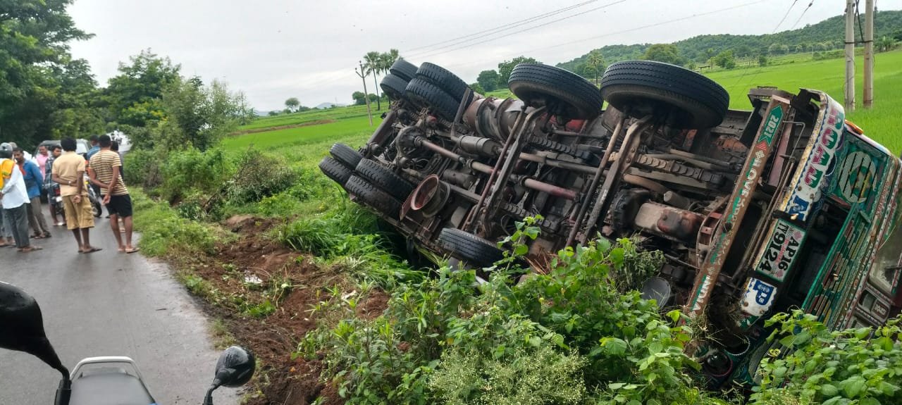 "Near Miss as Lorry Overturns, Driver Safe"