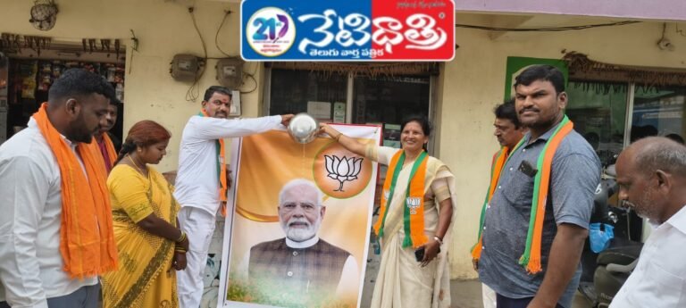 Modi Portrait Abhishekam in Odela