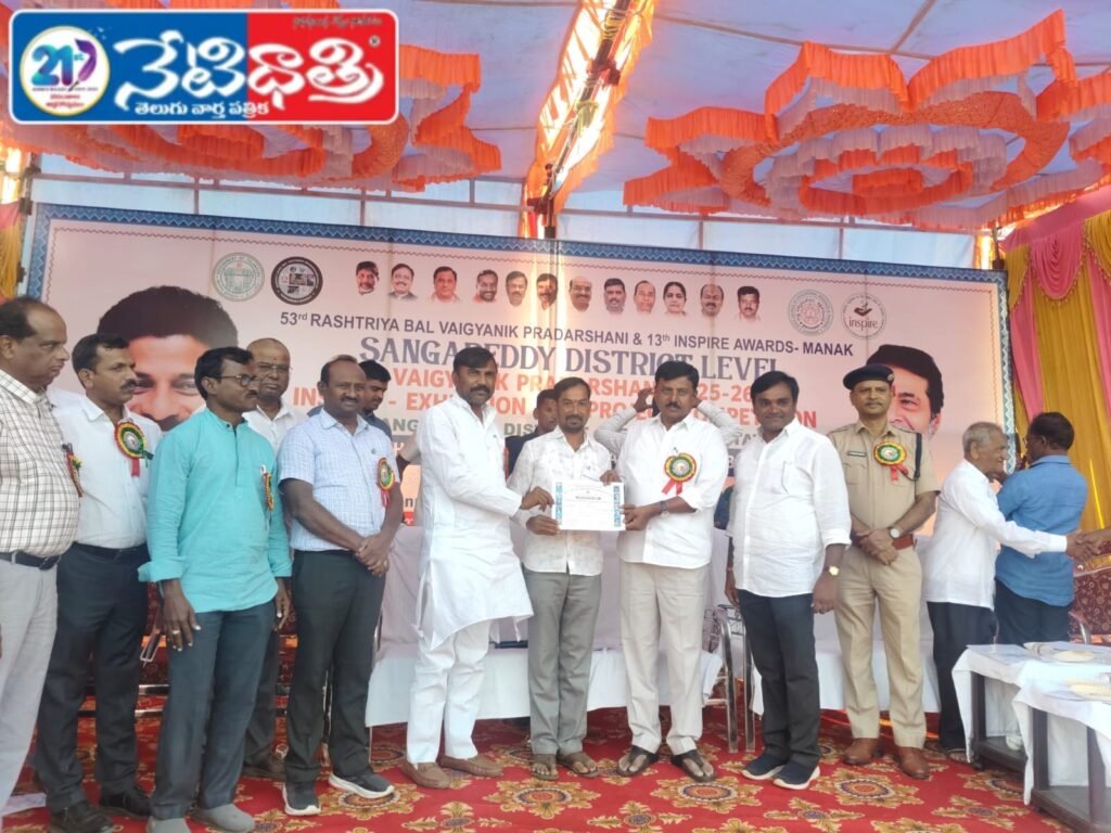 Teacher Suresh Wins District Award